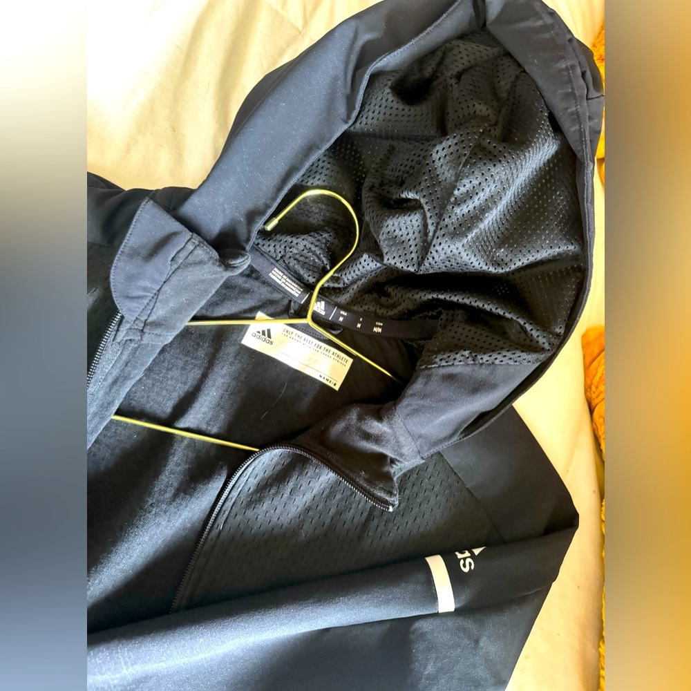 Like new Adidas jacket size medium maybe worn a couple times if that!